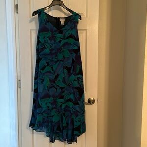 Chicos dress 100% silk, lined: ruffled angled bottom.